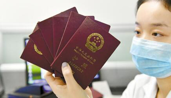 探访省公安厅出入境证件制作中心 揭秘护照如何出炉